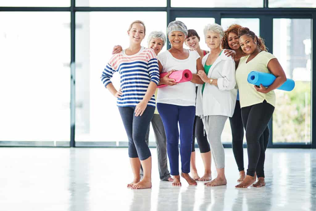 Group of women preparing to exercise in order to get great sleep