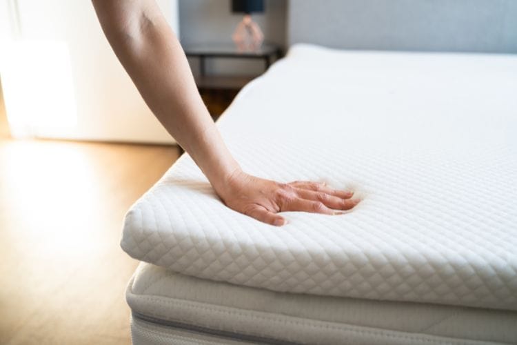 Memory foam mattress on a box spring